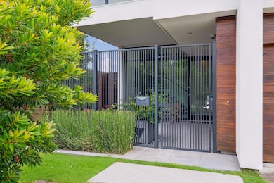 A private gated entry courtyard provides seclusion