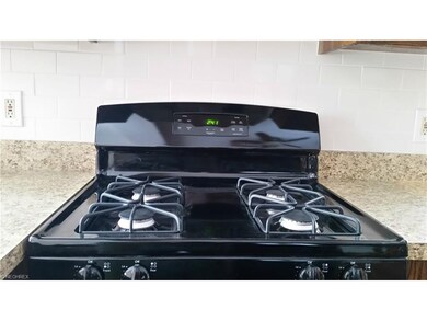 New range and wonderful subway tile backsplash