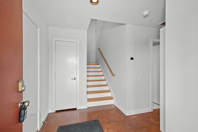 As you open front door, you have the stairs to the