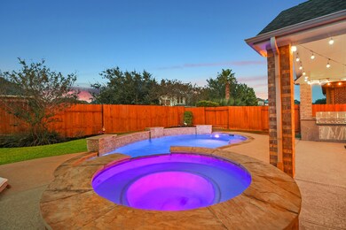 Custom designed Pool, Spa, perfectly placed to fit this Backyard with an outdoor kitchen.