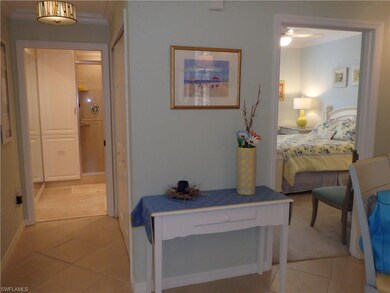 Hallway view to guest bath, note the stained glass