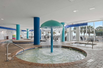 View of pool featuring an indoor hot tub