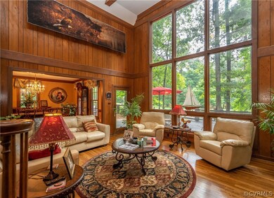 Floor to ceiling windows with view of 2nd tee box.