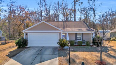 Single story home with a garage