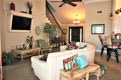 Built in TV and Spindle stairwell/ Living room