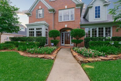 Now that we have shown you some of the highlights lets look at some of the details. The front yard has mature landscaping with large flower beds for seasonal planting. The stacked stone river rock trims the beds providing great curb appeal.