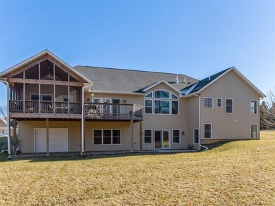 Rear elevation with screen porch, rear deck, walko