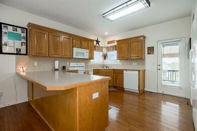 Kitchen with access to the back deck.