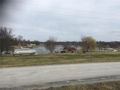 view of lake across the street from the lot