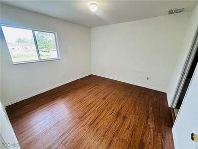 938 Eisenhower Blvd, Lehigh Acres, FL 33974 - photo 2