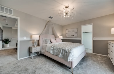 Comfortable secondary bedroom with generous closet space *Model representation
