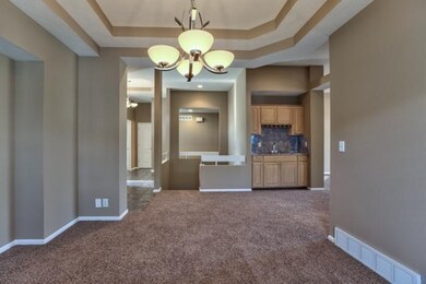 FROM FORMAL DINING LOOKING INTO WET BAR