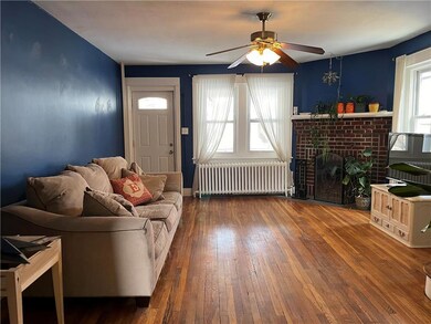 18 x 14.6 living room with fireplace, hardwood flo
