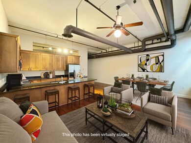 Living room with ceiling fan, dark wood-type floor