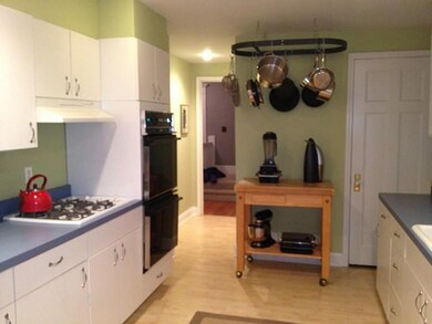 Kitchen. The pot rack has been terrific. It is hig