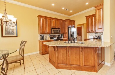 Kitchen opens up to living room and has eat-in are