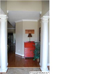 Columns each side of foyer.