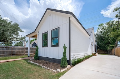 This modern, single-story home boasts fresh white