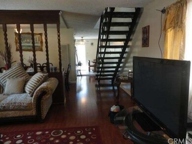 LAUNDRY ROOM, HALF BATH AND KITCHEN ARE BEHIND THE