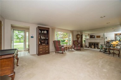 This view shows the foyer's opening into the livin