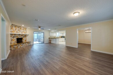 3 open layout living room with fireplace
