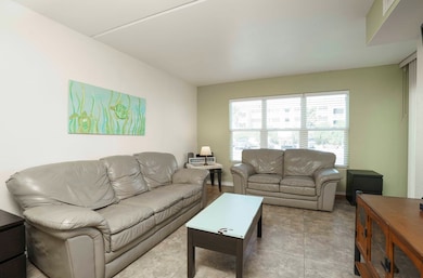 Living room that opens to the balcony