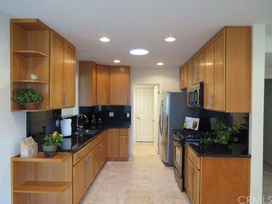 Contemporary style cabinets with granite counters,