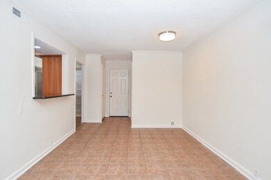 Dining room and view of the bar and back door.