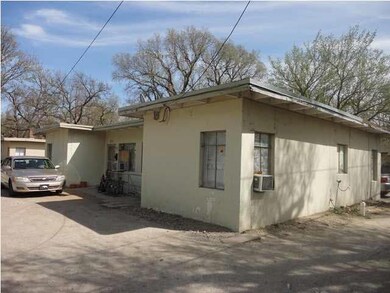2 duplexes. side by side. Alley way between church