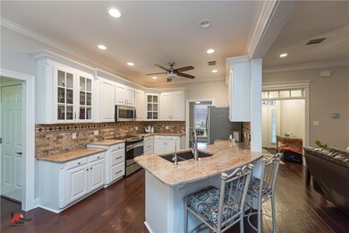 Kitchen features gorgeous granite counter tops and