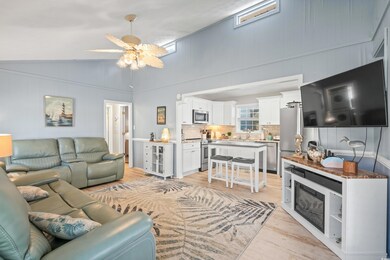 Living room with wood walls, light wood-type floor