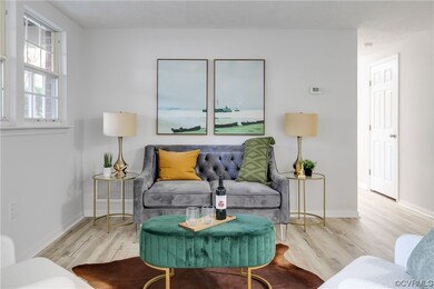 Living room featuring light hardwood flooring