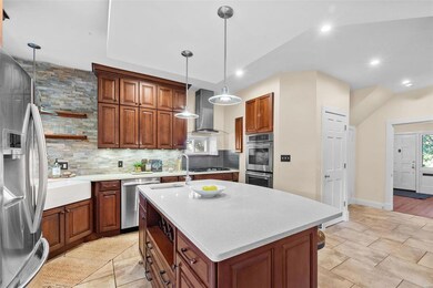 Remodeled kitchen with stainless steel appliances,
