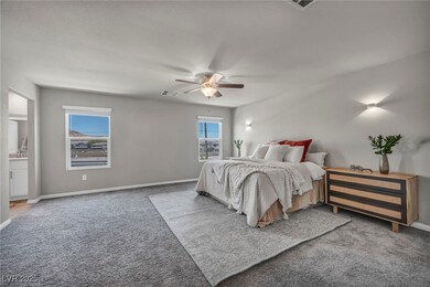 Carpeted bedroom featuring baseboards and a ceilin