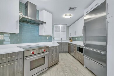 JUST renovated with new custom cabinets, quartz co