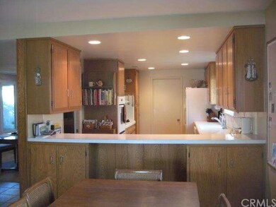 Kitchen is open to a very large eating table- room