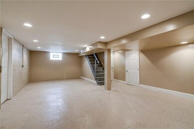 Large Finished basement with 5 doors leading to th