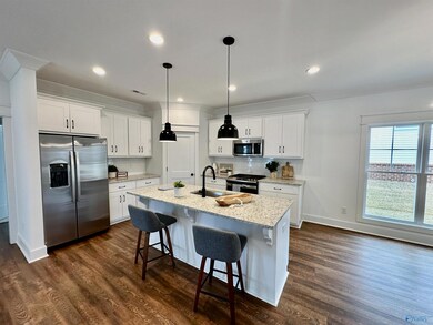 Granite Countertops, Gas Range, and Large Island!   Refrigerator Included.