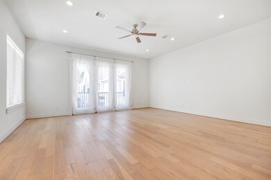 A wider view of the living area showcases the eleg