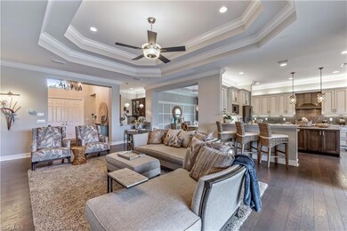 Open Great Room with wet bar, open kitchen, formal