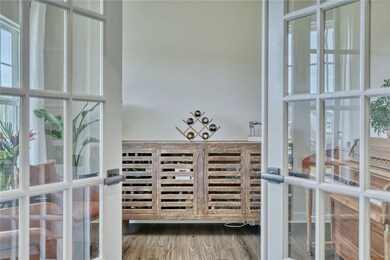 FRENCH DOORS LEAD TO 1ST FLR MEDIA/OFFICE