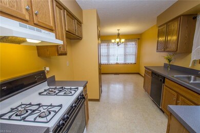 Kitchen with a view of dining area.