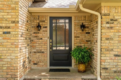 Beautiful glass front door welcomes you to this home.