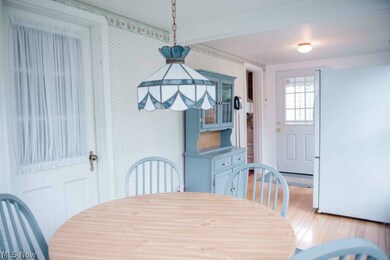The morning room is light and bright, and just the right spot for breakfast and casual meals. The floor is beautiful hardwood!