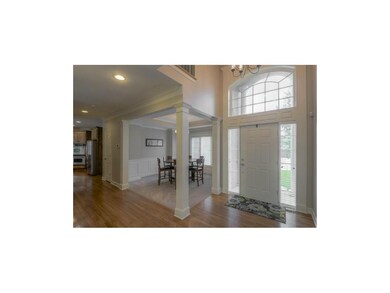 Grand 2 Story Entrance with view into Formal Dinin