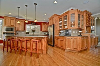 Kitchen w/island, SS appliances & cabinets galore