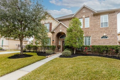 This beautiful home offers great curb appeal with its lush landscaping and an upgraded stone elevation.