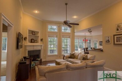 Great room with cozy fireplace and built in shelve