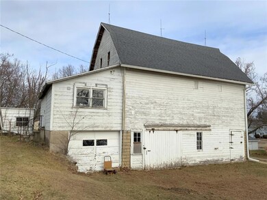Two story barn with shop on upper level. Newer roo