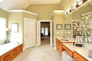 Large master bath with huge walk in closet   